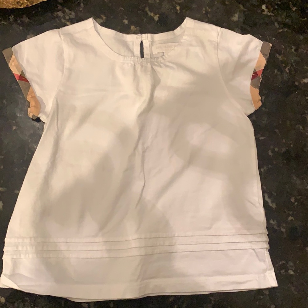 A Burberry kids shirt in a size 5y